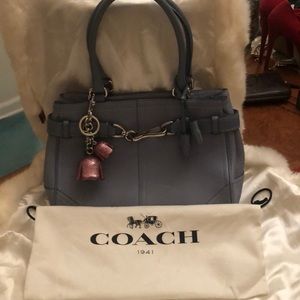 Designer handbag with hardware
